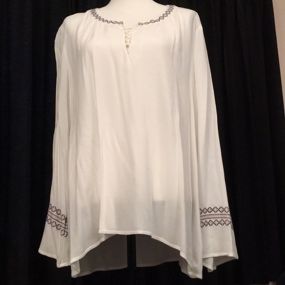 White/off white bell sleeved blouse.
